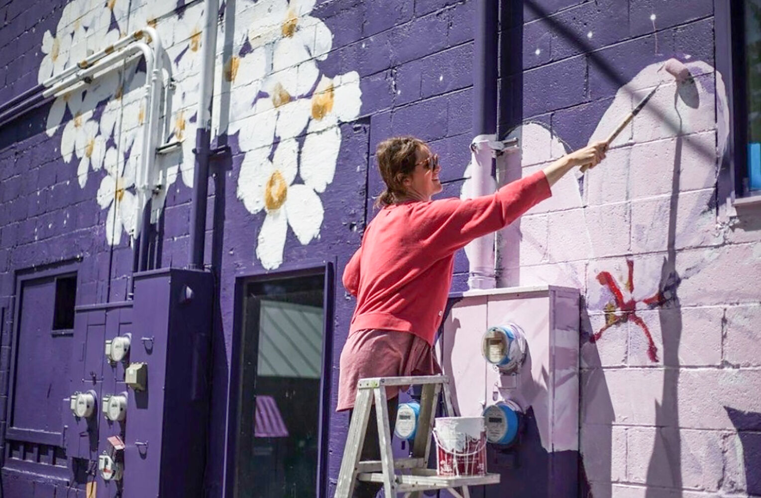Katy Fox paints mural photo